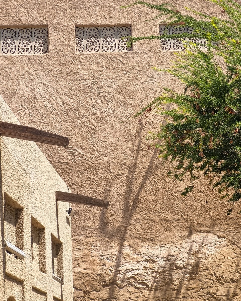 A building with a clock on the side of it